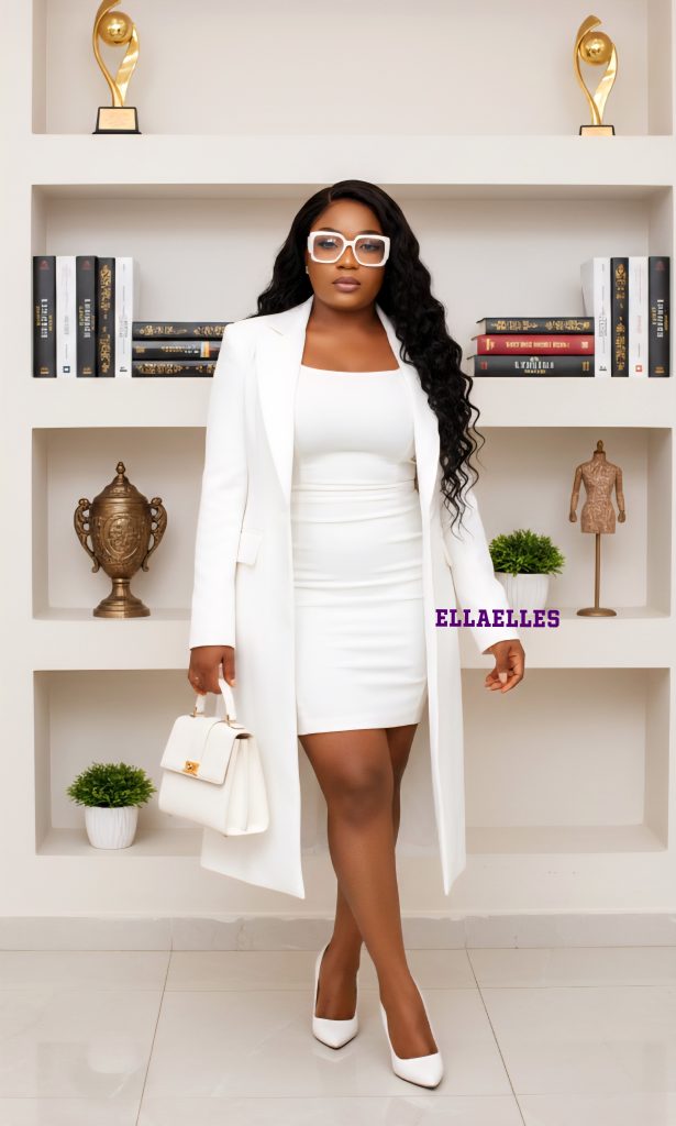 Shop this stunning monochromatic set features a precision-tailored ivory white mini dress and a dramatic floor-length structured blazer coat. 